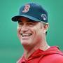 John Farrell shared a laugh with Dustin Pedroia during a workout at Fenway Park on Thursday. 